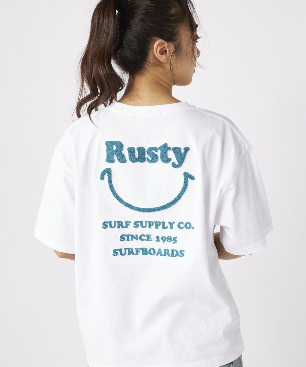 RUSTYレディース ニコちゃん相良刺繍Tシャツ 襟ワンポイント