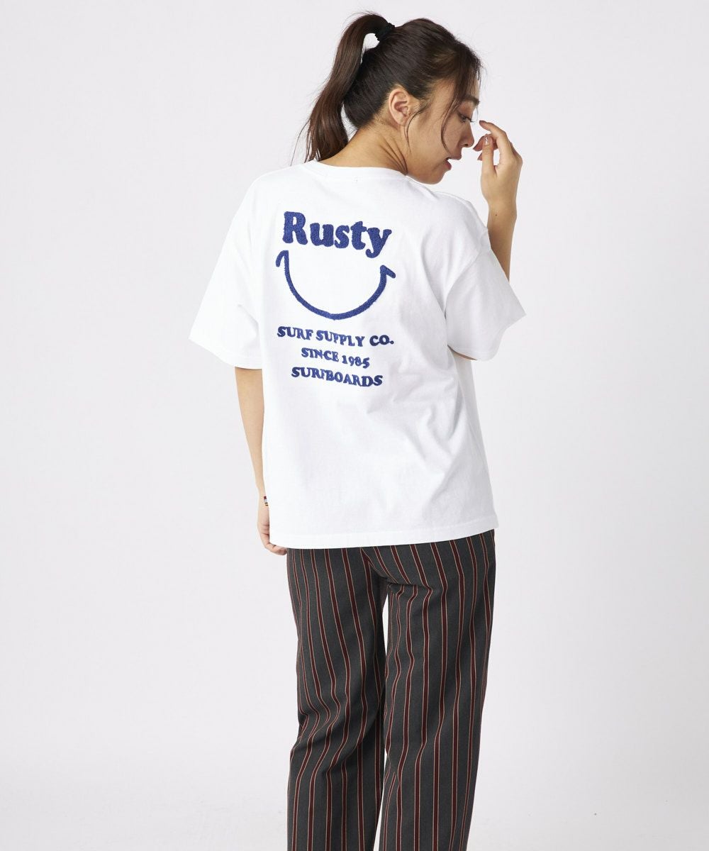 RUSTYレディース ニコちゃん相良刺繍Tシャツ 襟ワンポイント