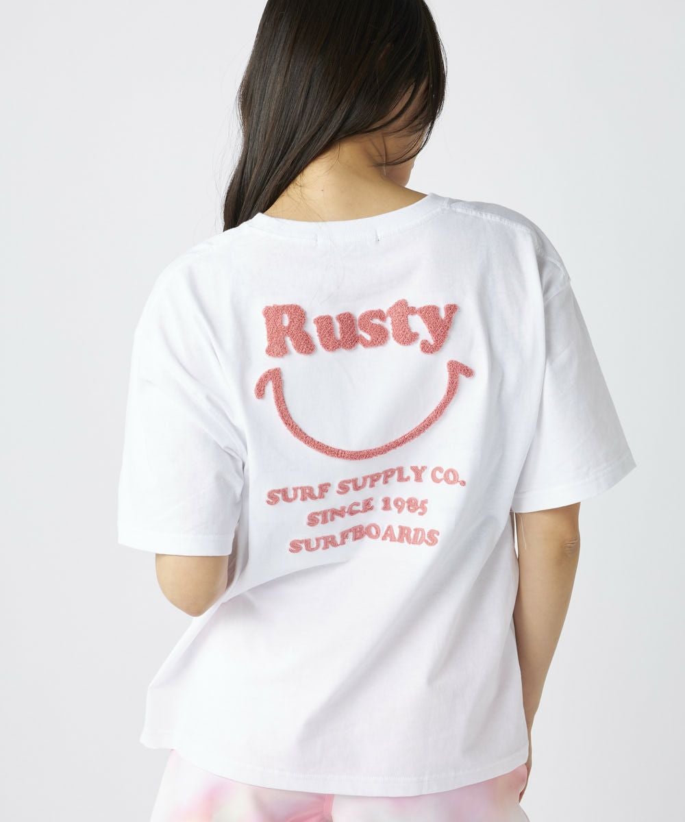 RUSTYレディース ニコちゃん相良刺繍Tシャツ 襟ワンポイント